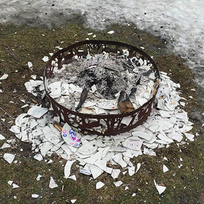 Plates in the bonfire following the Lung Leavin' Day Celebration, 2016.