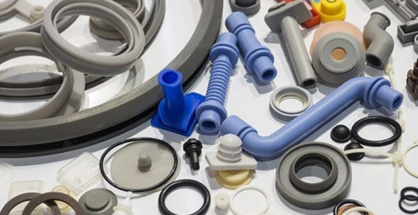 Image shows an assortment of plastic parts.
