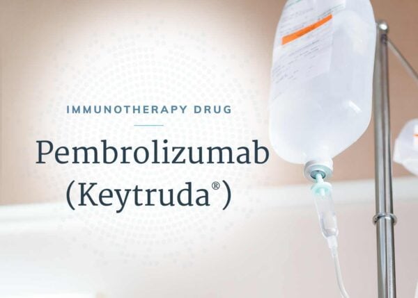 A sterile infusion bag of pembrolizumab (Keytruda®) immunotherapy hangs from an IV stand.
