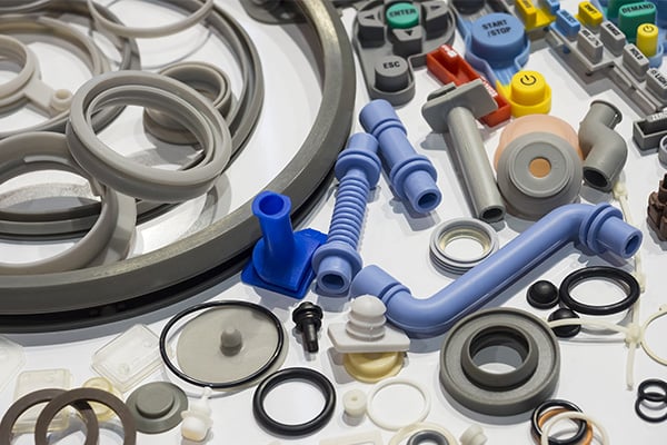Image shows an assortment of plastic parts.