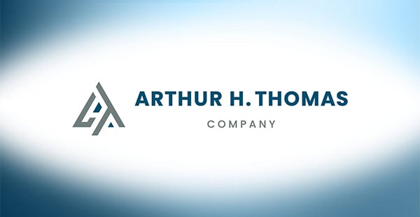 Arthur H. Thomas company name with its logo to the left