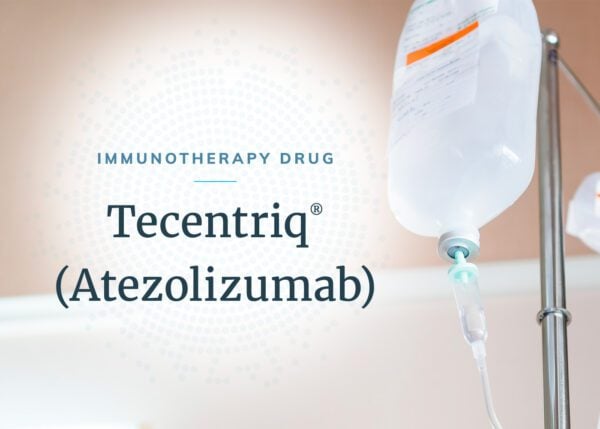 The words “Immunotherapy Drug” in small light blue text, over the words “Tecentriq (atezolizumab)” in larger dark blue text. There is an image of a clear white IV bag.