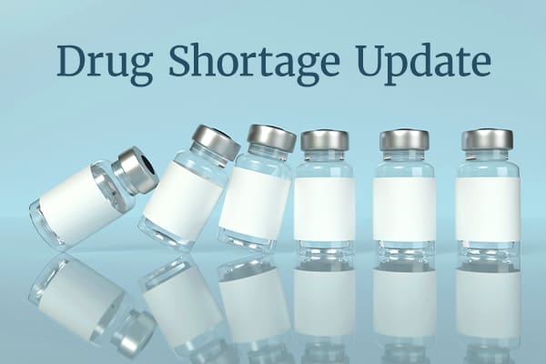 Six small empty vials are lined up. The left-most are tipping into the others, like dominoes. Text reads "Drug Shortage Update."