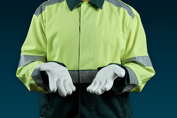 Plant worker wearing personal protective equipment (PPE)